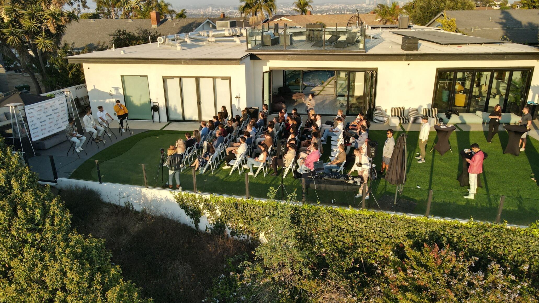 Entrepreneurs and investors networking at premium Kamp startup event